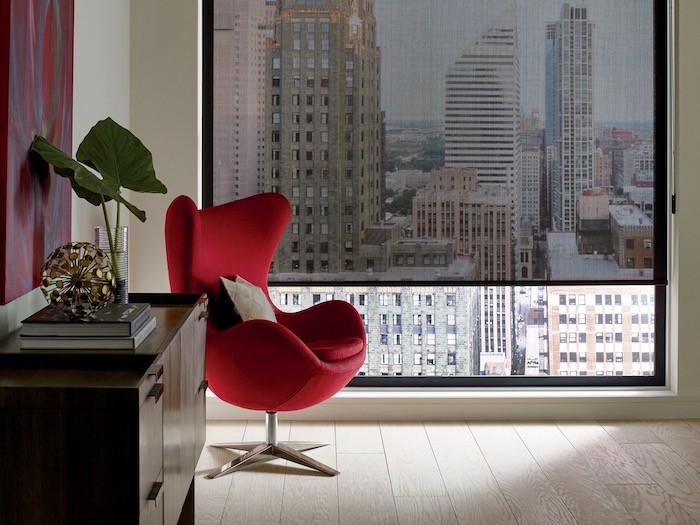 A room with a red side chair.