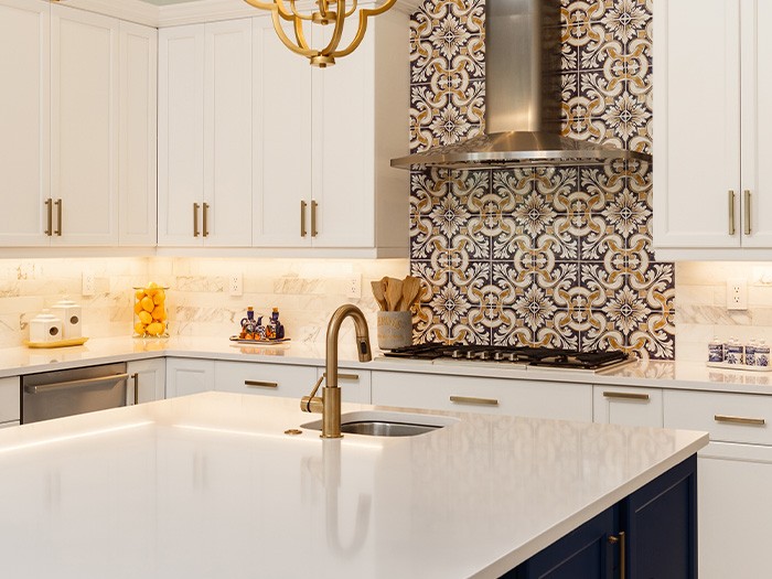 Kitchen island with a small prep sink.